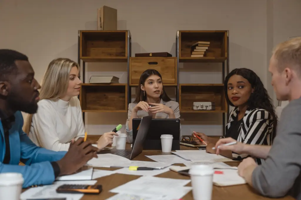 A digital marketing team having a meeting at an office